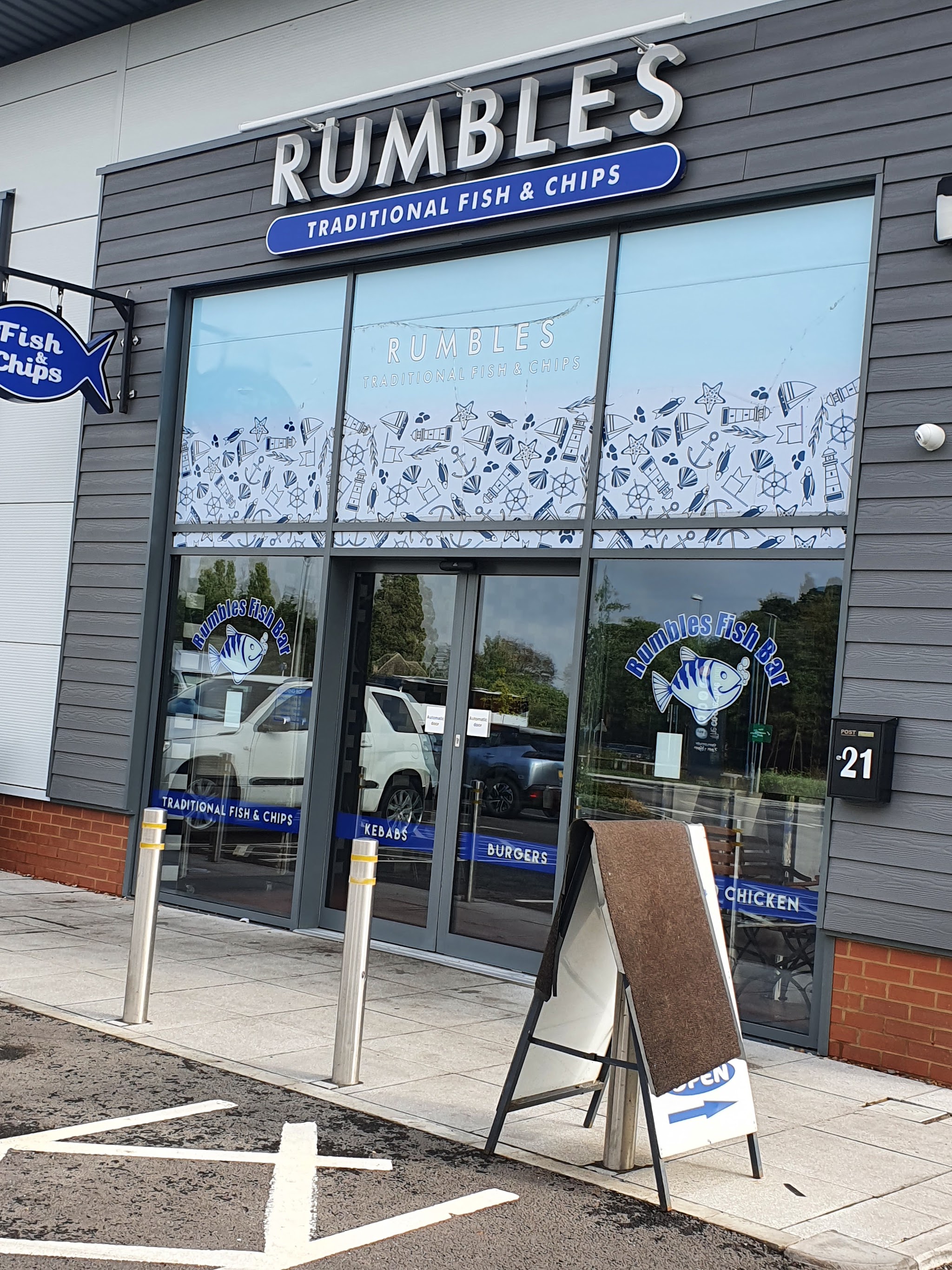 The glass shopfront of Rumbles Traditional Fish & Chips