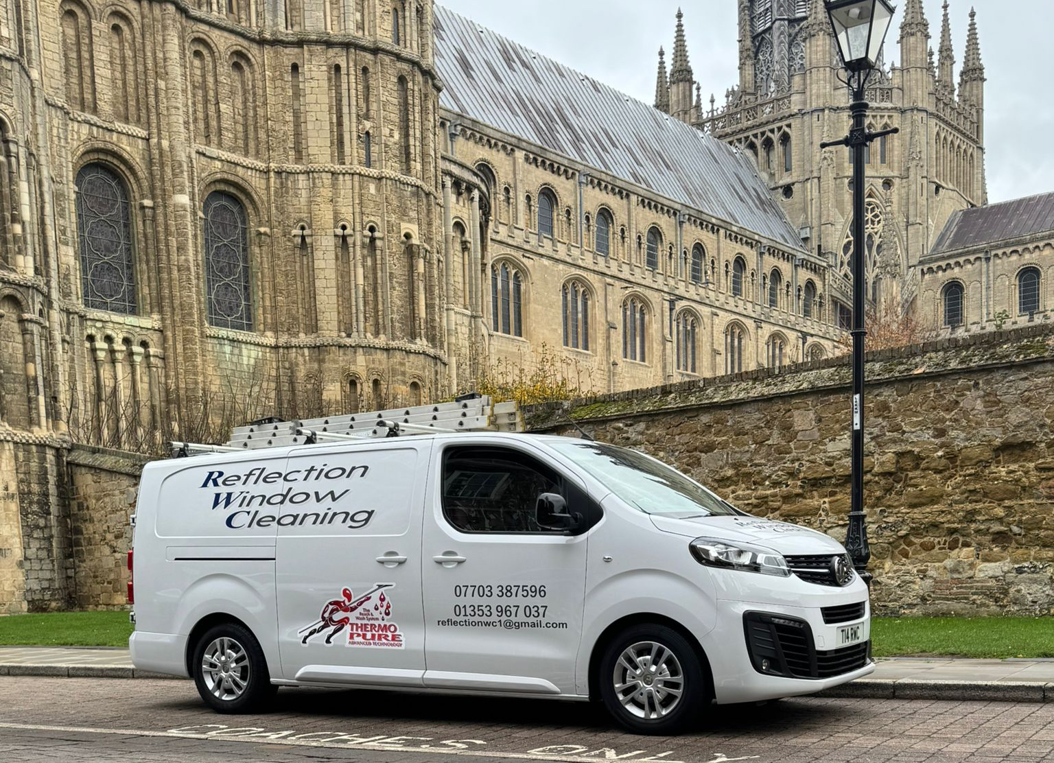 The Reflection Window Cleaning van parked beside Ely Cathedral